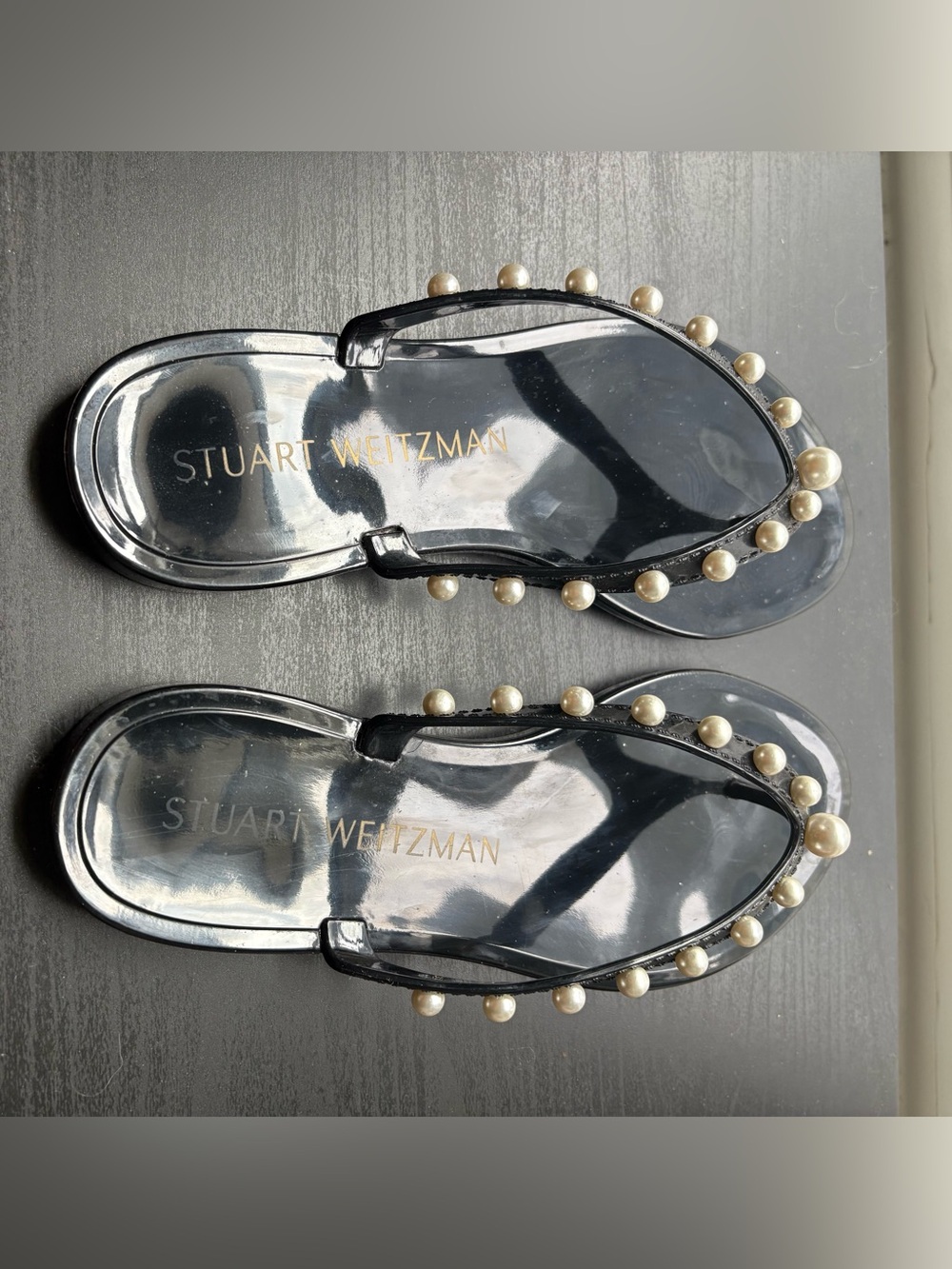 Stuart Weitzman black pearl jelly flip flops